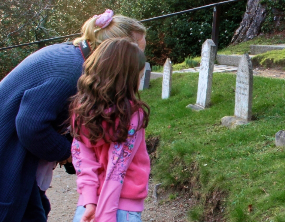 Woman and young girl visiting the Pet Cemetery.