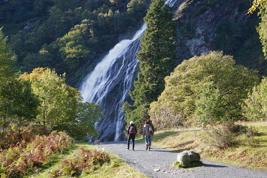 Hikers heading towards the Powerscourt Waterfall.